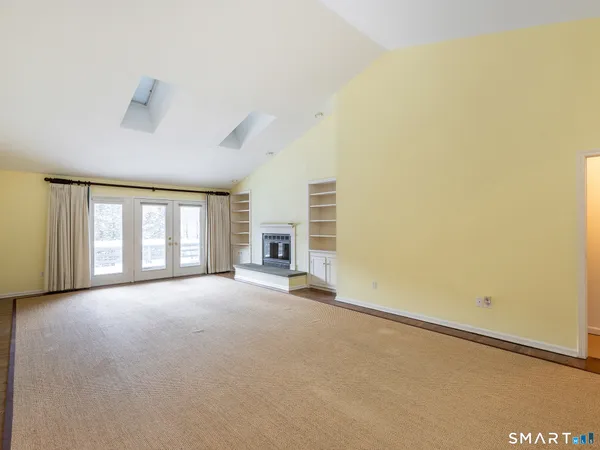 an empty room with windows