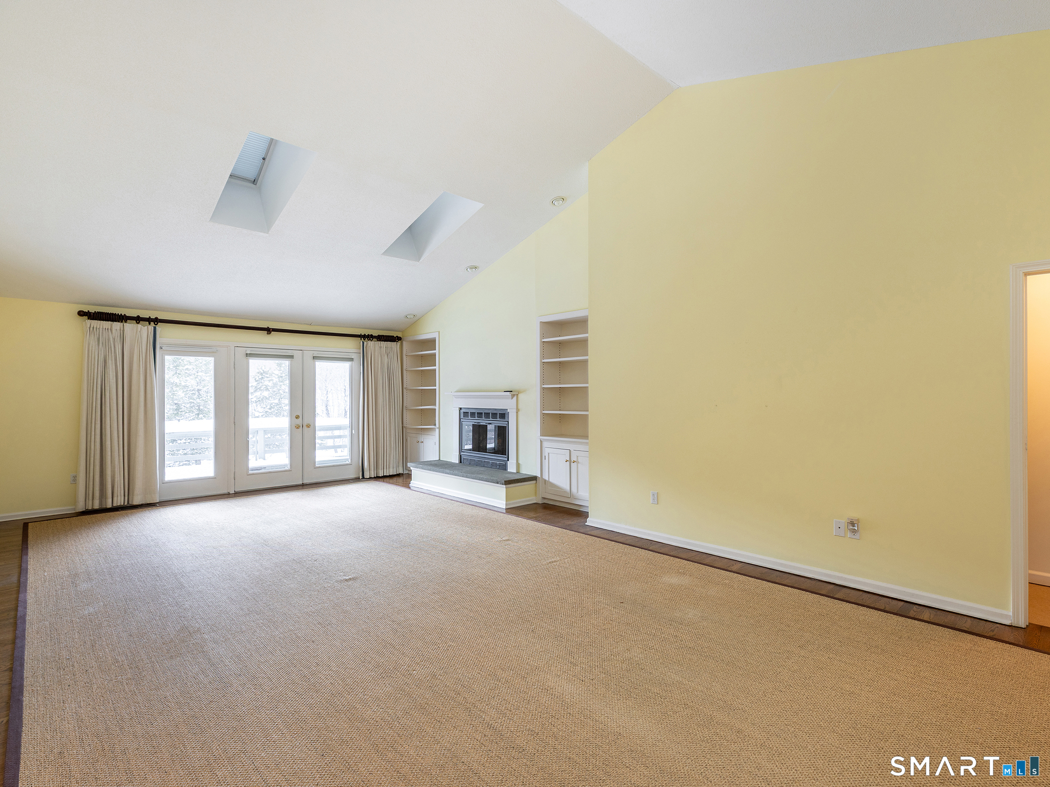 19 Juniper Meadow Road, Unit 19 Washington, CT 06794 - Photo 6 of 31 an empty room with windows