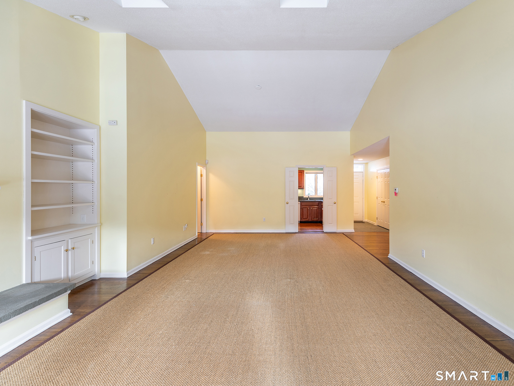 19 Juniper Meadow Road, Unit 19 Washington, CT 06794 - Photo 10 of 31 a view of empty room with wooden floor