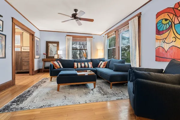 a living room with furniture and a window