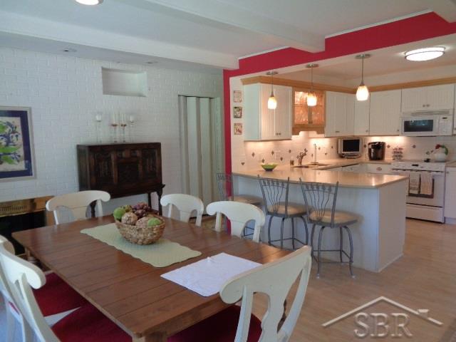 401 Stoneham Road Saginaw, MI 48638 - Photo 9 of 24 Dining Area Fireplace