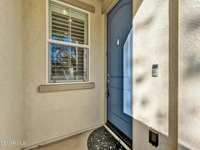 a view of balcony with wooden floor