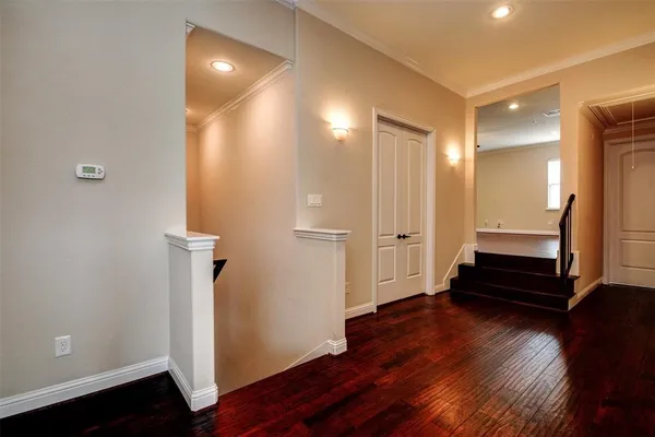 a view of a elevator with wooden floor