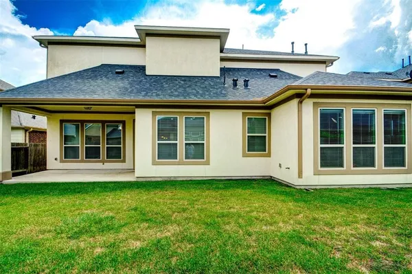 a house view with a garden space