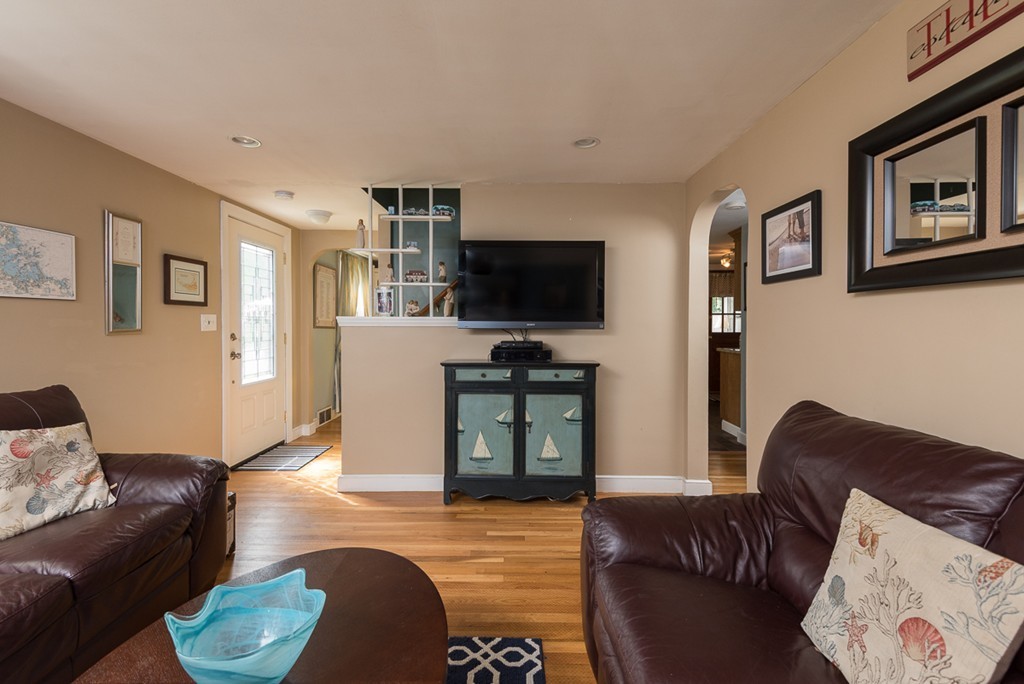 30 Wilder Road Norwell, MA 02061 - Photo 13 of 25 a living room with furniture and a flat screen tv