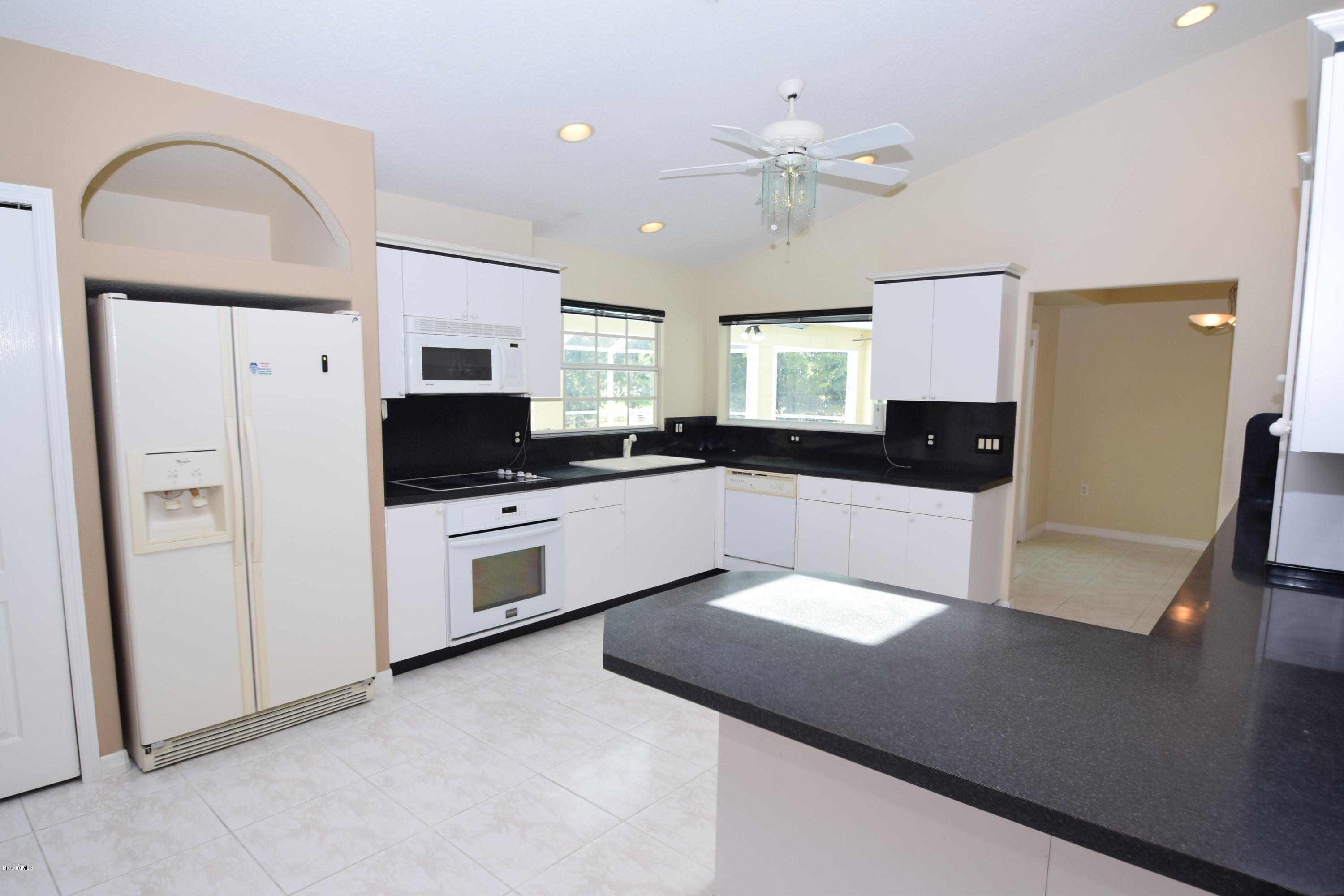 1219 Winding Meadows Road Rockledge, FL 32955 - Photo 11 of 26 GREAT VIEWS OF THE POOL!