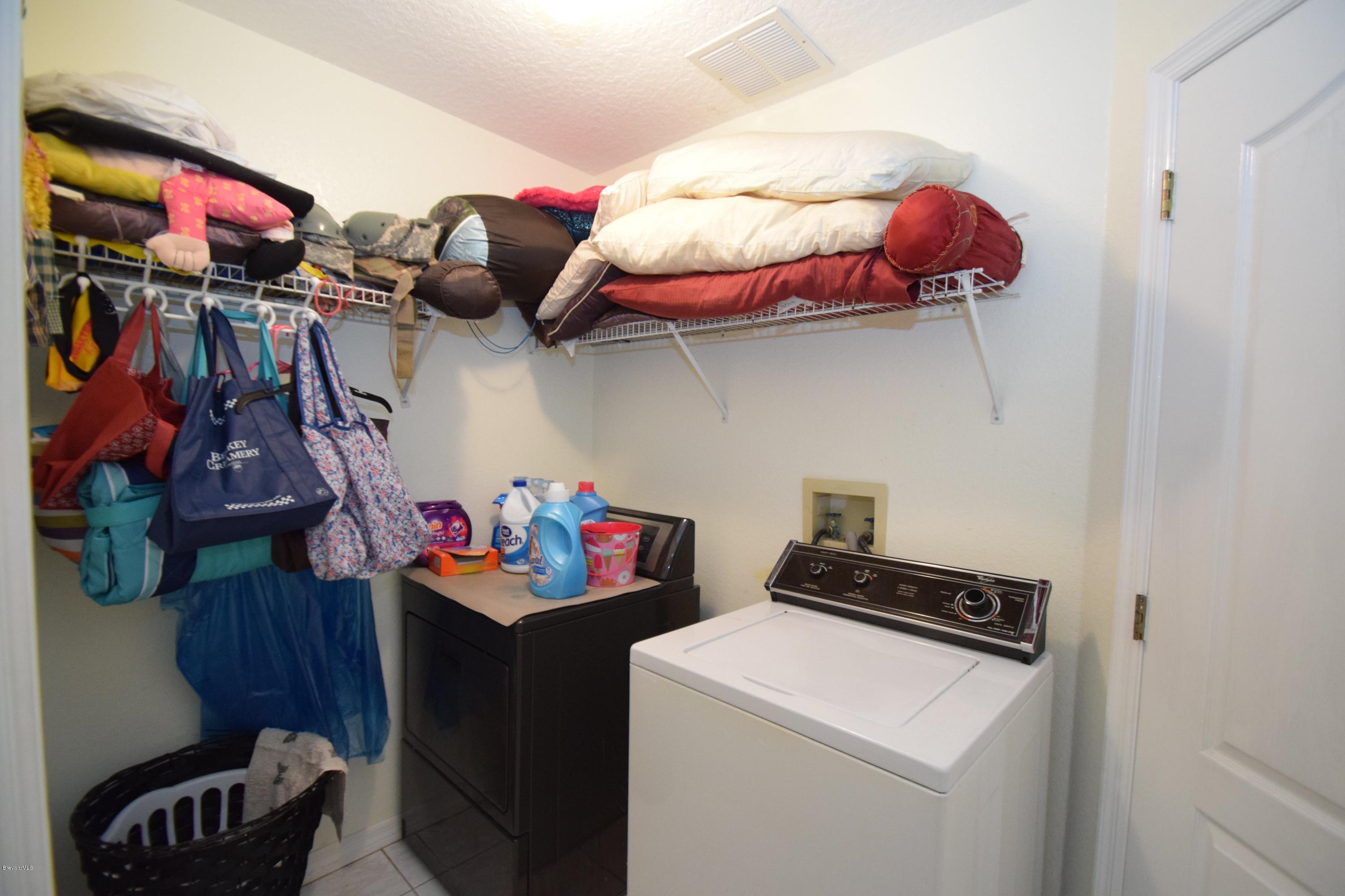 1219 Winding Meadows Road Rockledge, FL 32955 - Photo 17 of 26 INDOOR LAUNDRY ROOM!
