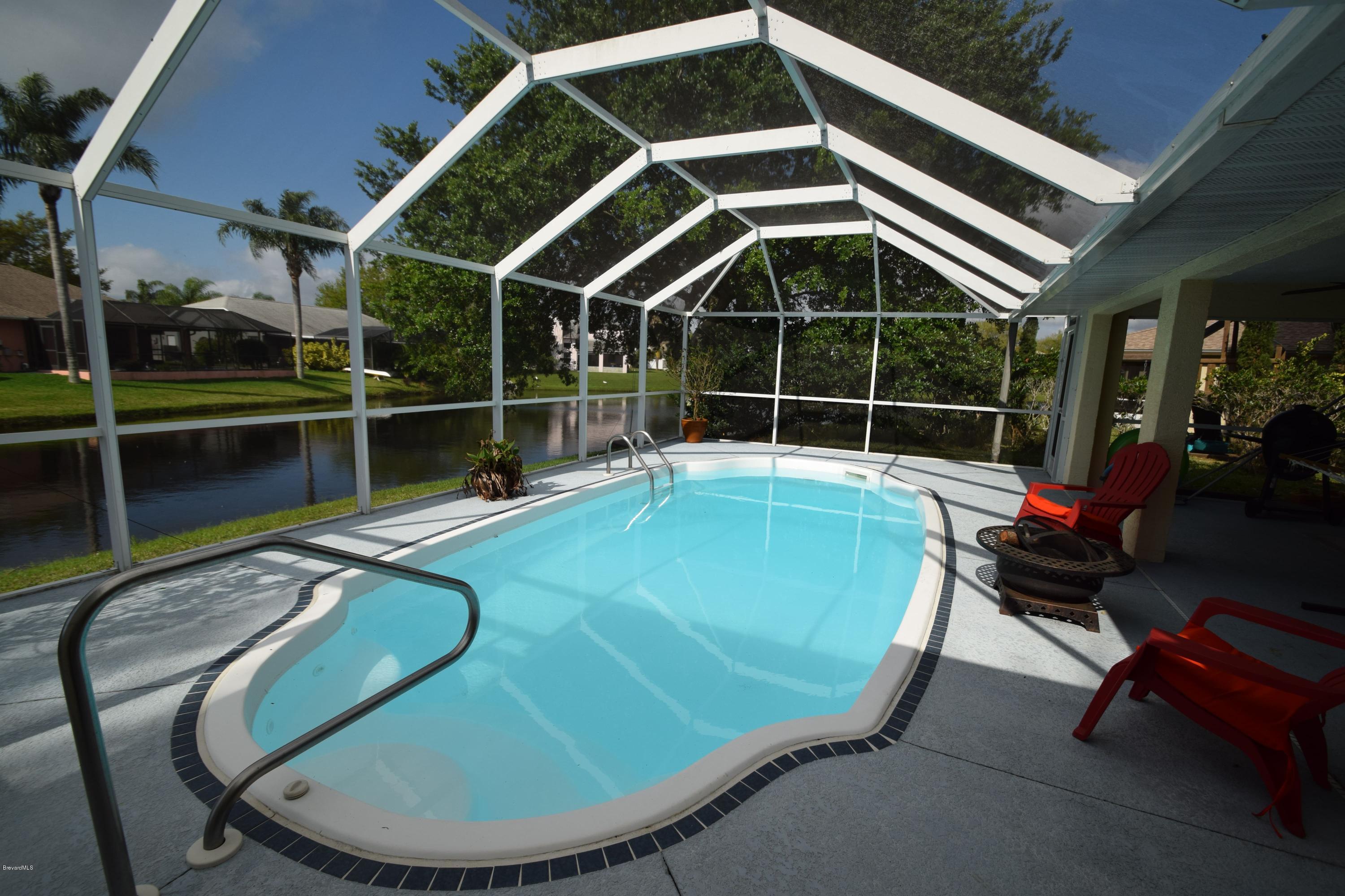 1219 Winding Meadows Road Rockledge, FL 32955 - Photo 20 of 26 COMPLETELY SCREENED-IN!