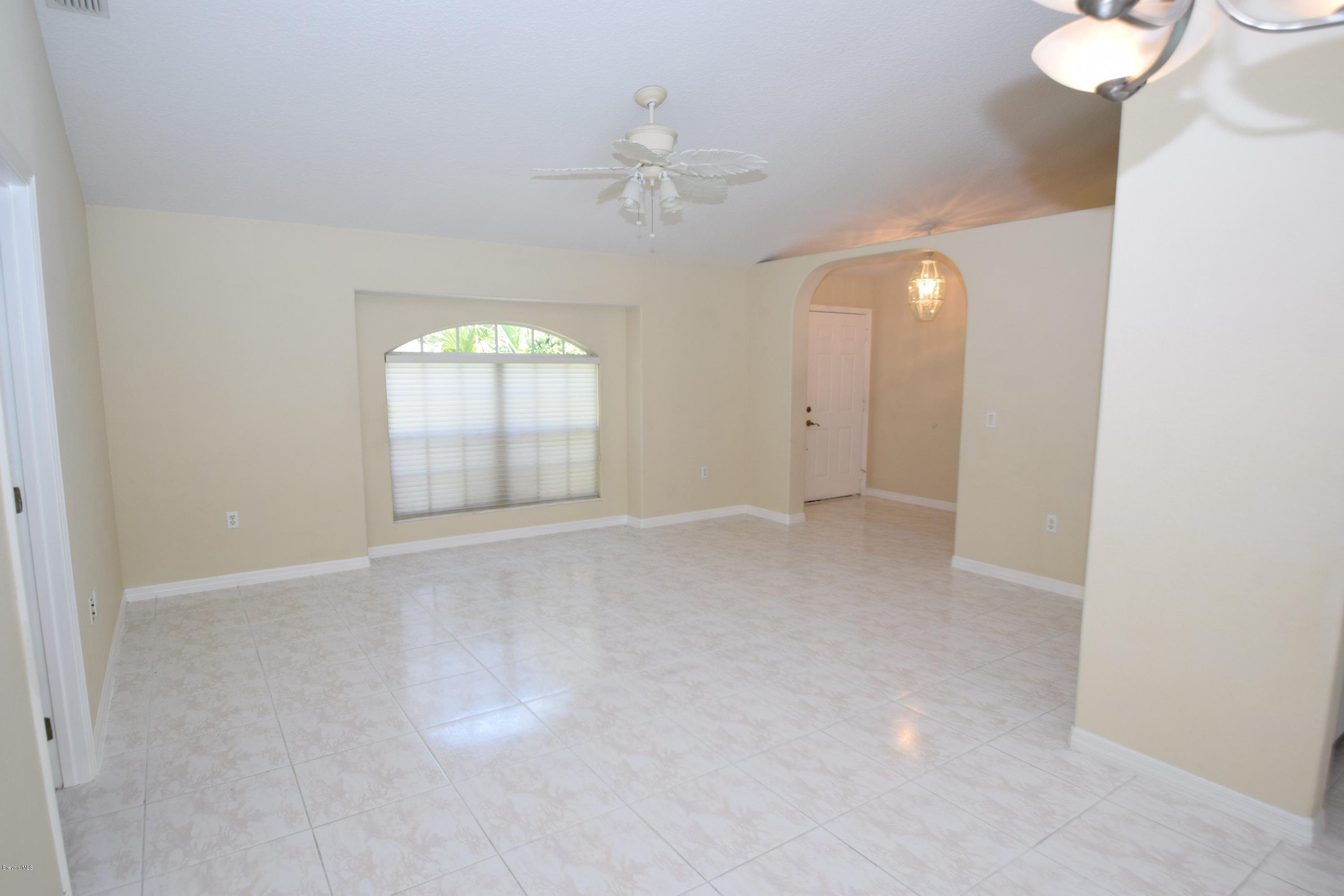 1219 Winding Meadows Road Rockledge, FL 32955 - Photo 4 of 26 SPACIOUS LIVING ROOM!