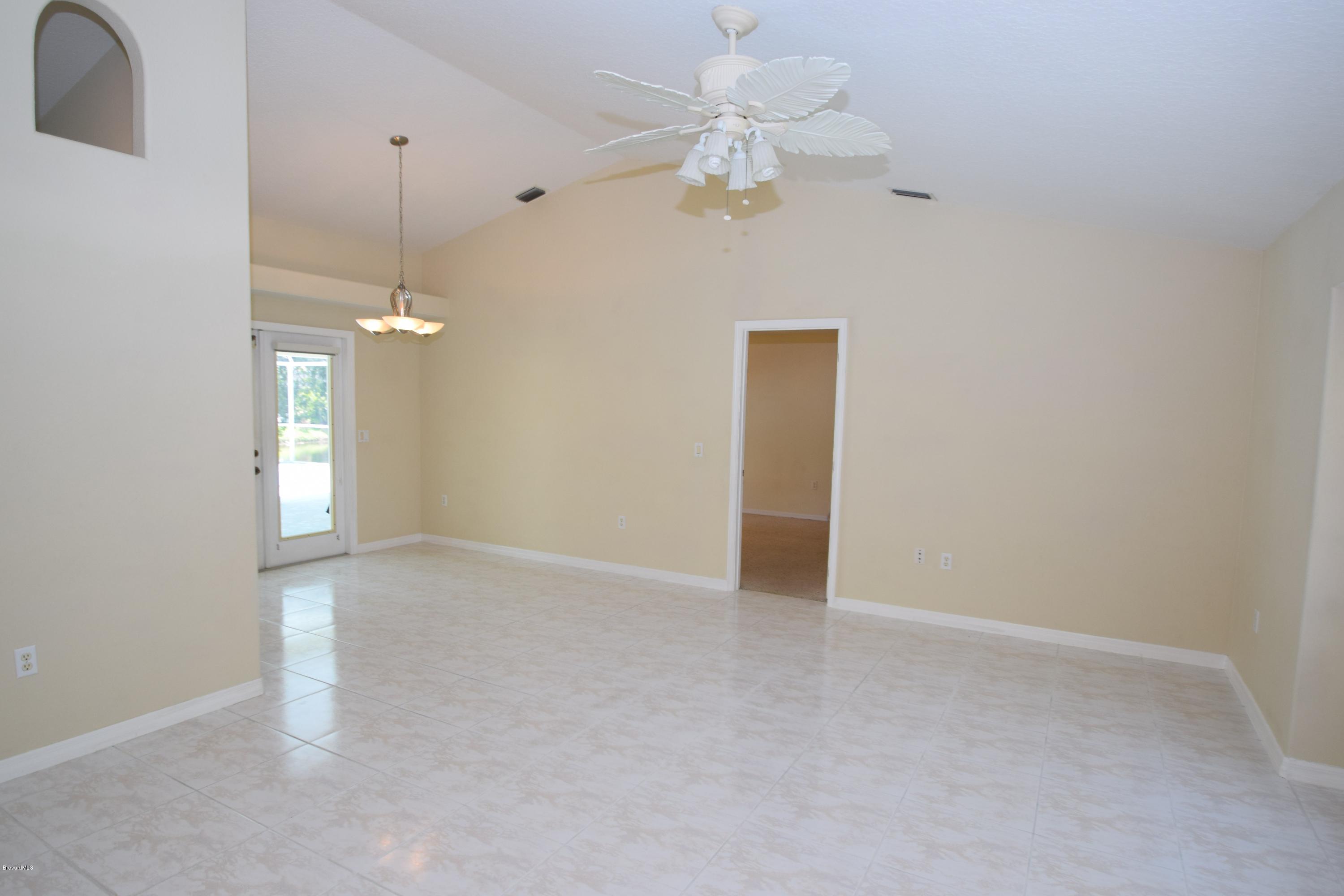 1219 Winding Meadows Road Rockledge, FL 32955 - Photo 5 of 26 LIVING ROOM/DINING ROOM COMBO!