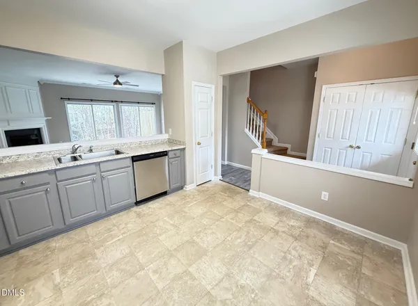 a view of a kitchen with a sink