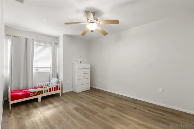 a room with couch and chandelier