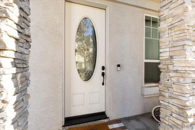 a view of a door and utility room