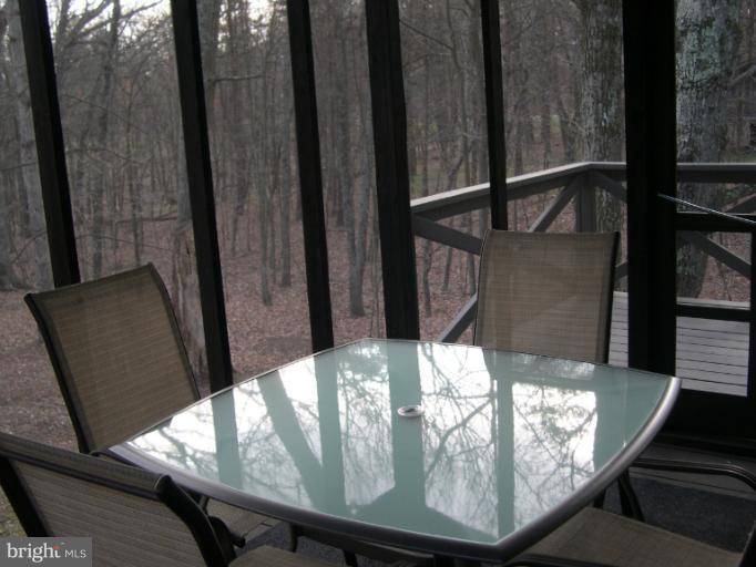 66 Mild Winter Road Hedgesville, WV 25427 - Photo 19 of 20 Screened in Porch