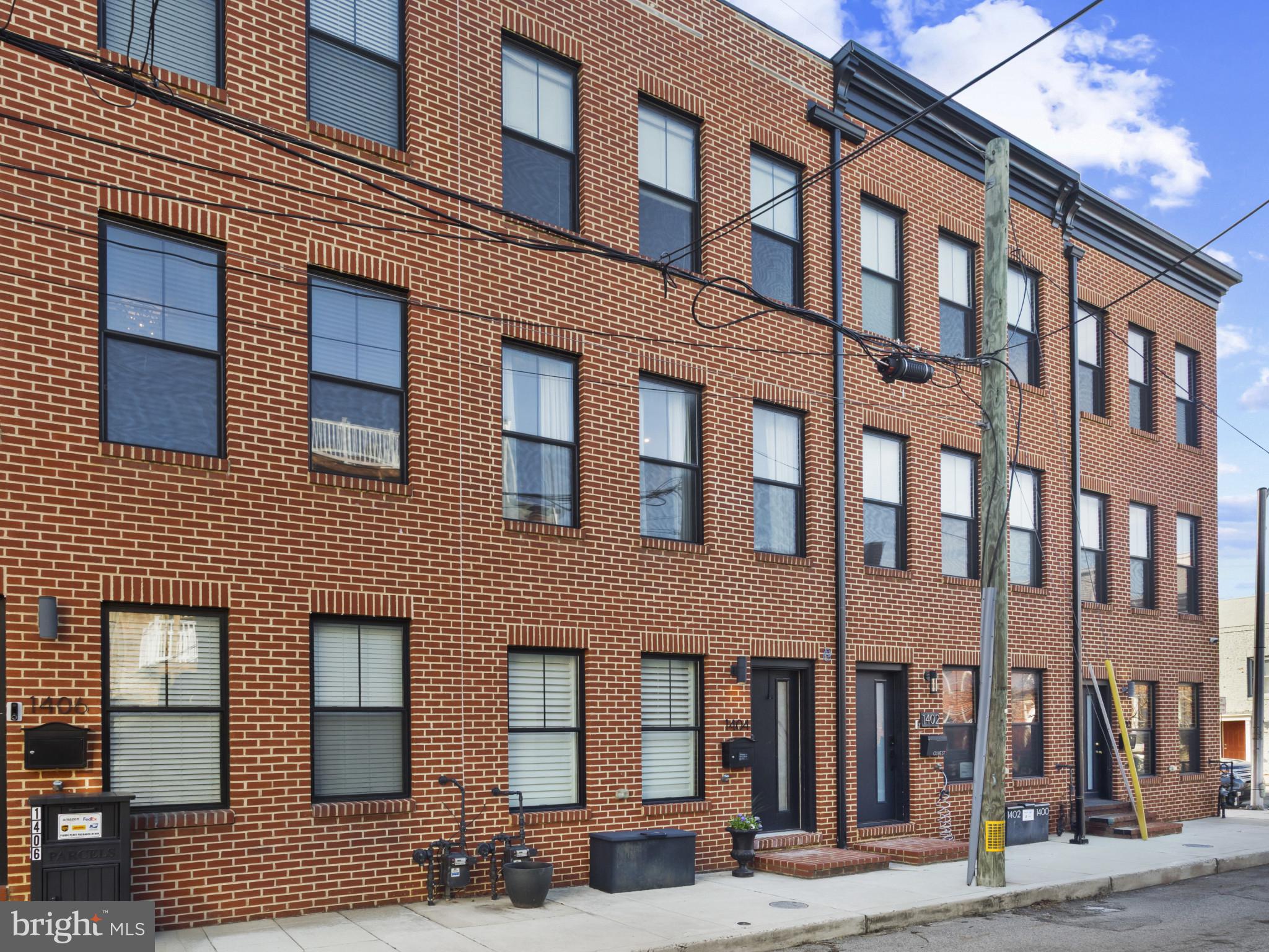 1404 Olive Street Baltimore, MD 21230 - Photo 1 of 38 a front view of a building