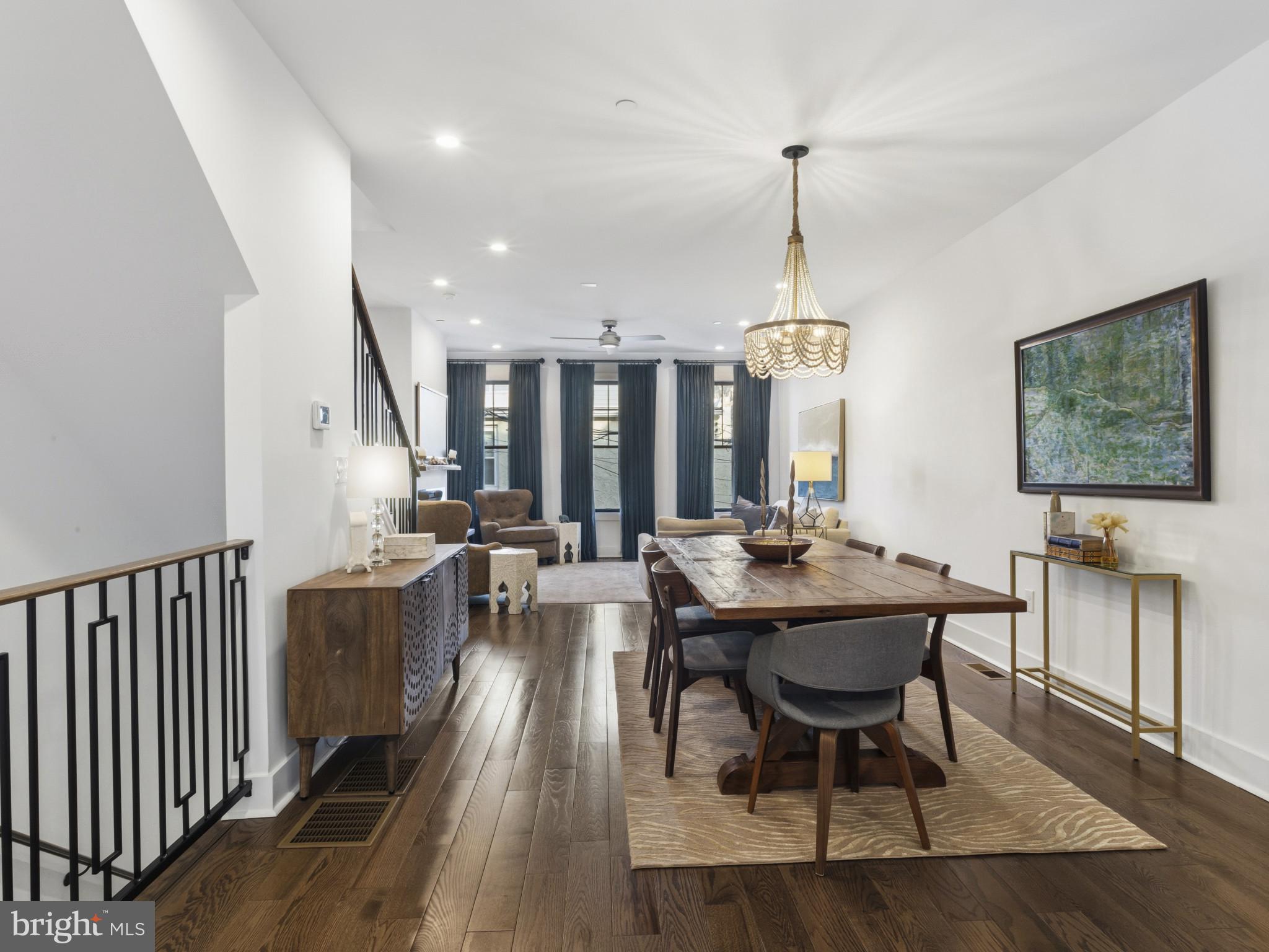 1404 Olive Street Baltimore, MD 21230 - Photo 11 of 38 a view of a dining room with furniture window and wooden floor