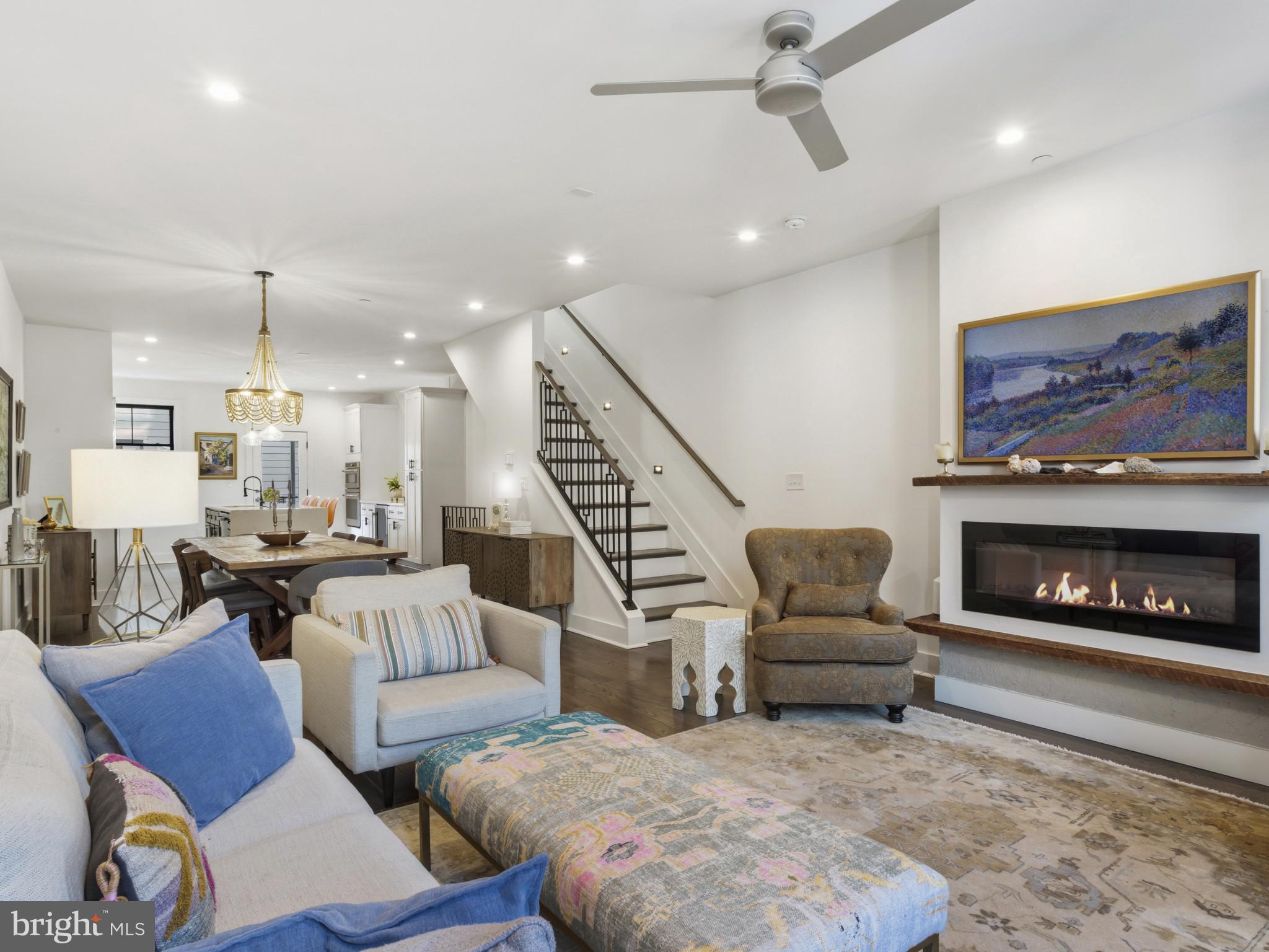 1404 Olive Street Baltimore, MD 21230 - Photo 14 of 38 a living room with furniture and a fireplace