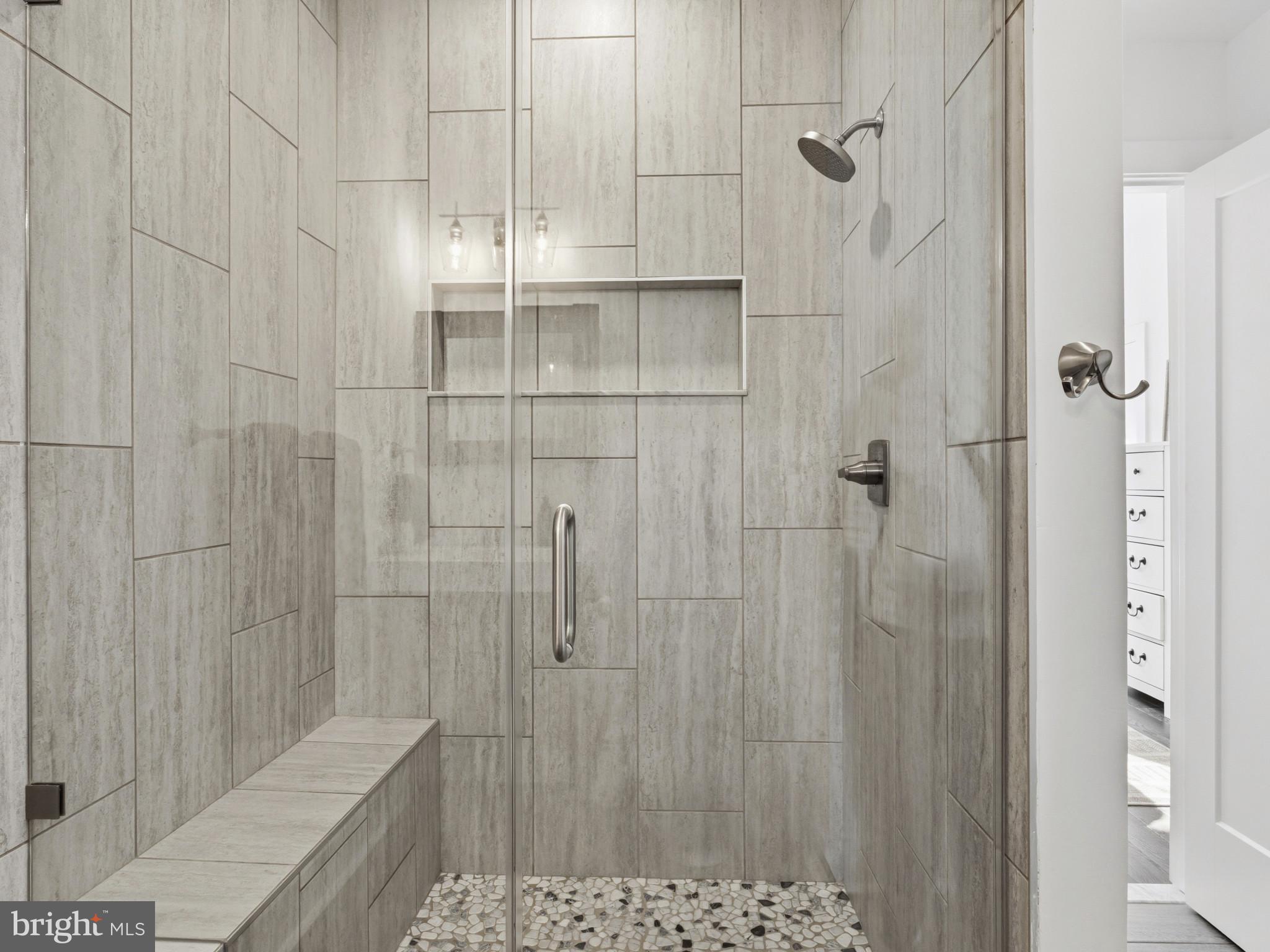 1404 Olive Street Baltimore, MD 21230 - Photo 19 of 38 a bathroom with a shower