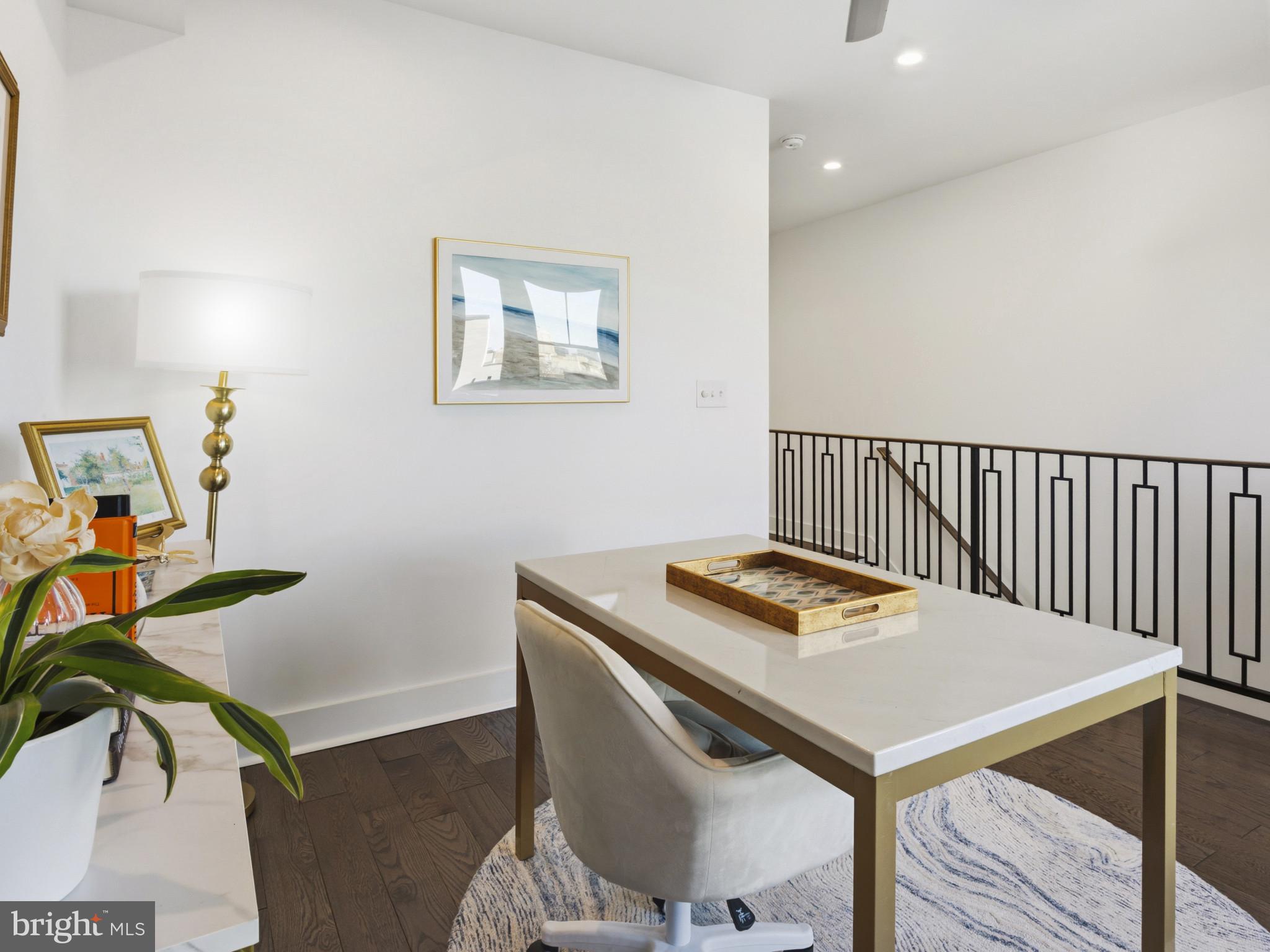 1404 Olive Street Baltimore, MD 21230 - Photo 29 of 38 a view of a dining room with furniture and wooden floor