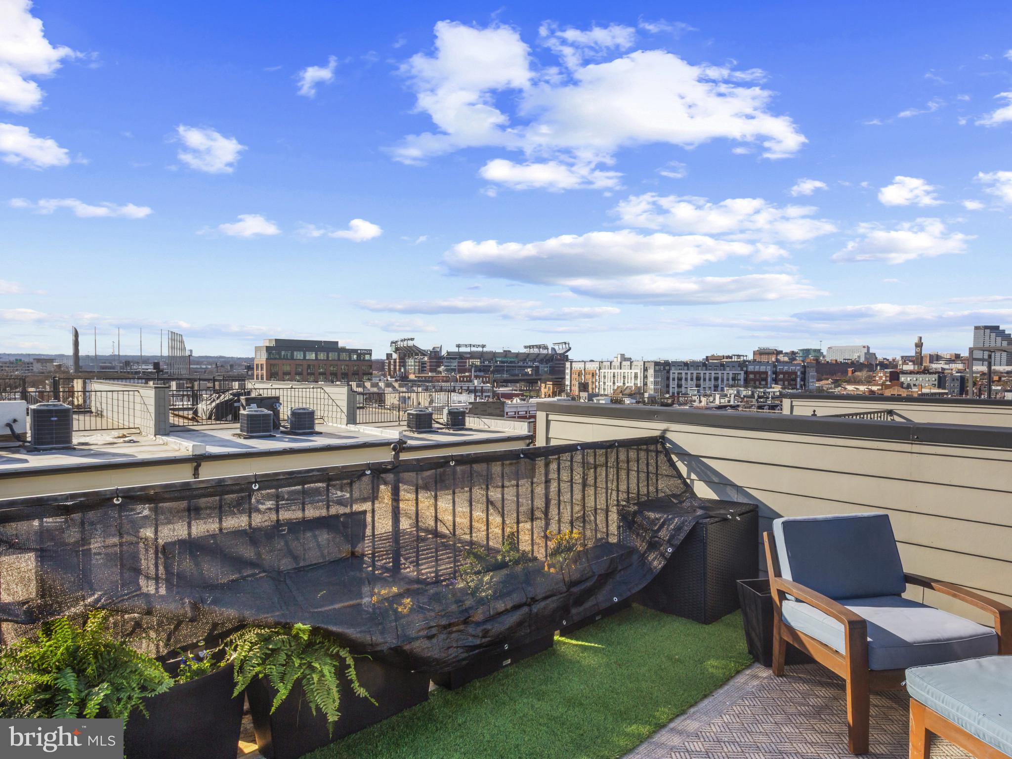 1404 Olive Street Baltimore, MD 21230 - Photo 36 of 38 a view of a chairs and table in the terrace