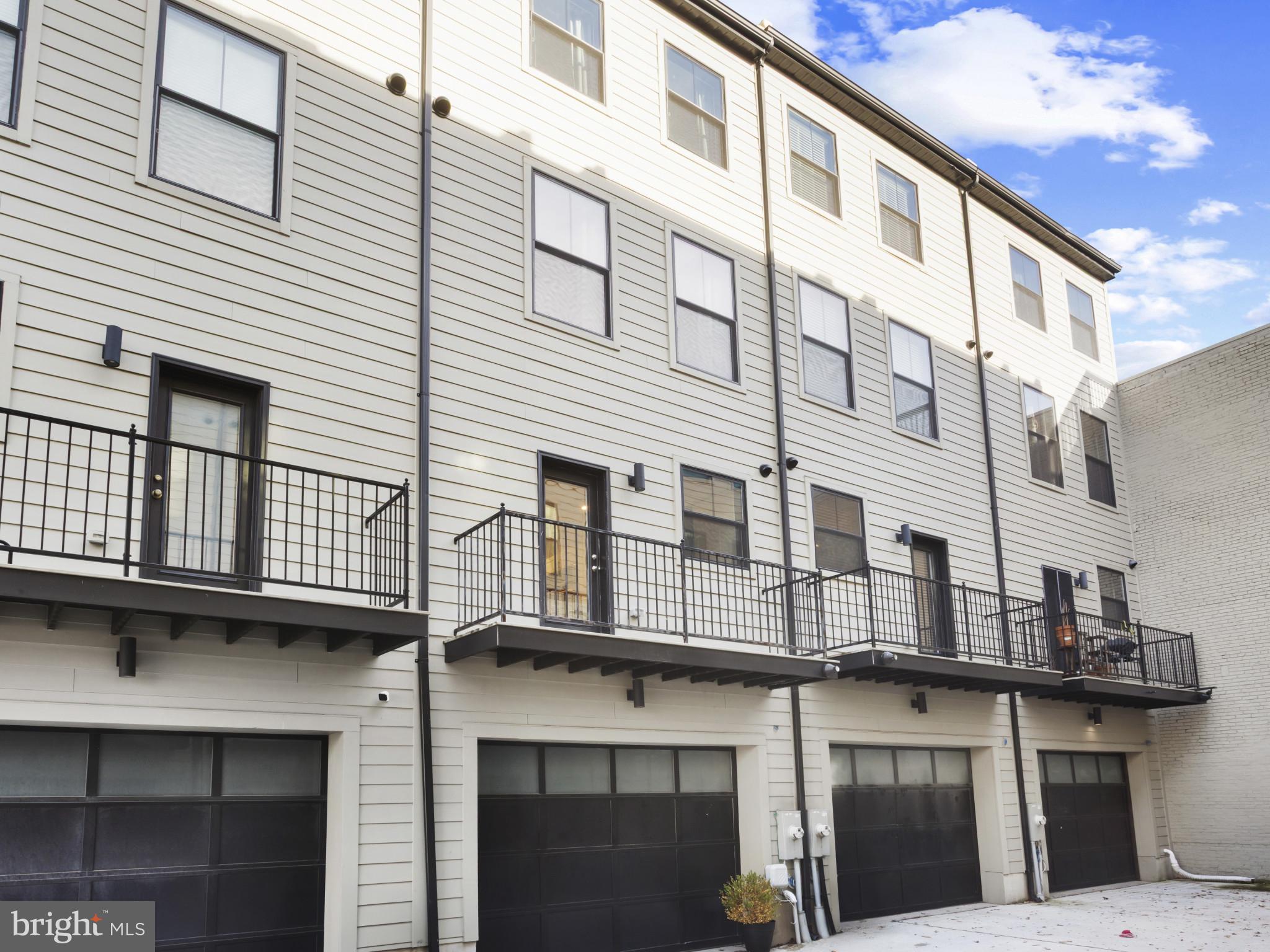 1404 Olive Street Baltimore, MD 21230 - Photo 38 of 38 a front view of a building with balcony