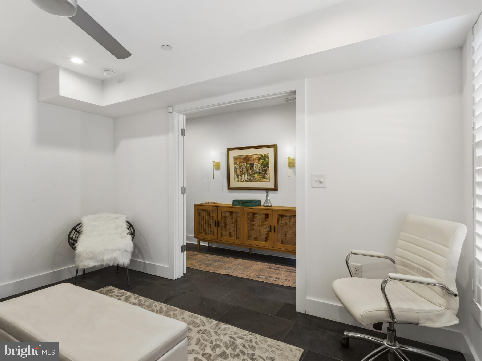 1404 Olive Street Baltimore, MD 21230 - Photo 5 of 38 a living room with a couch and a rug