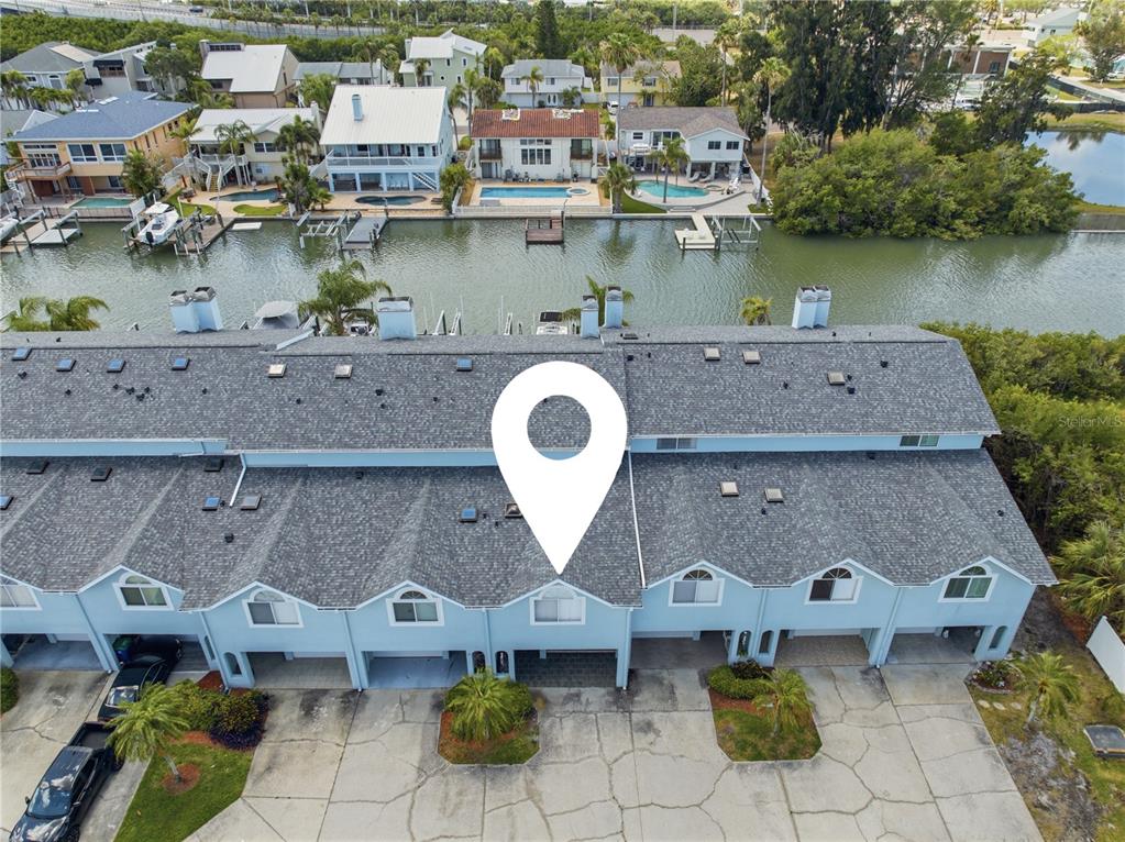 643 Garland Circle Indian Rocks Beach, FL 33785 - Photo 61 of 81 an aerial view of a house with outdoor space and lake view