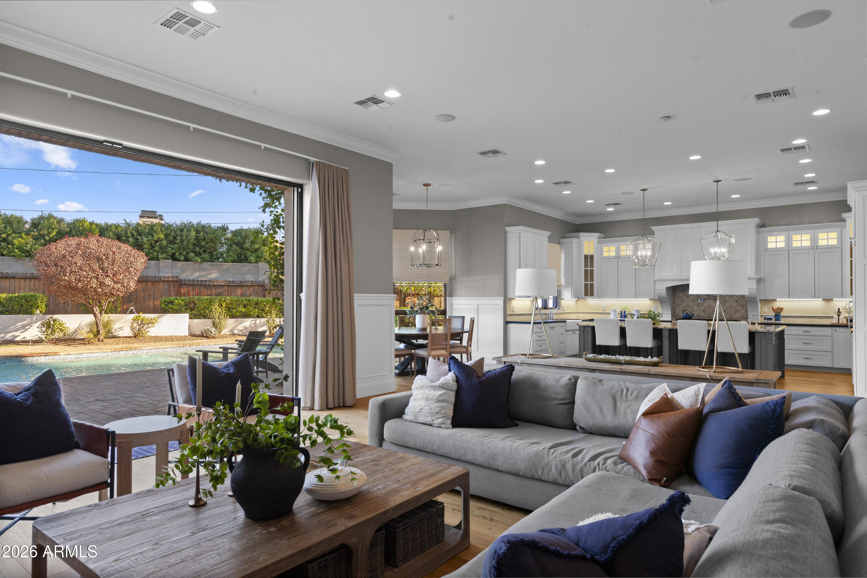 4909 North 45th Place Phoenix, AZ 85018 - Photo 14 of 45 a living room with furniture kitchen view and a large window