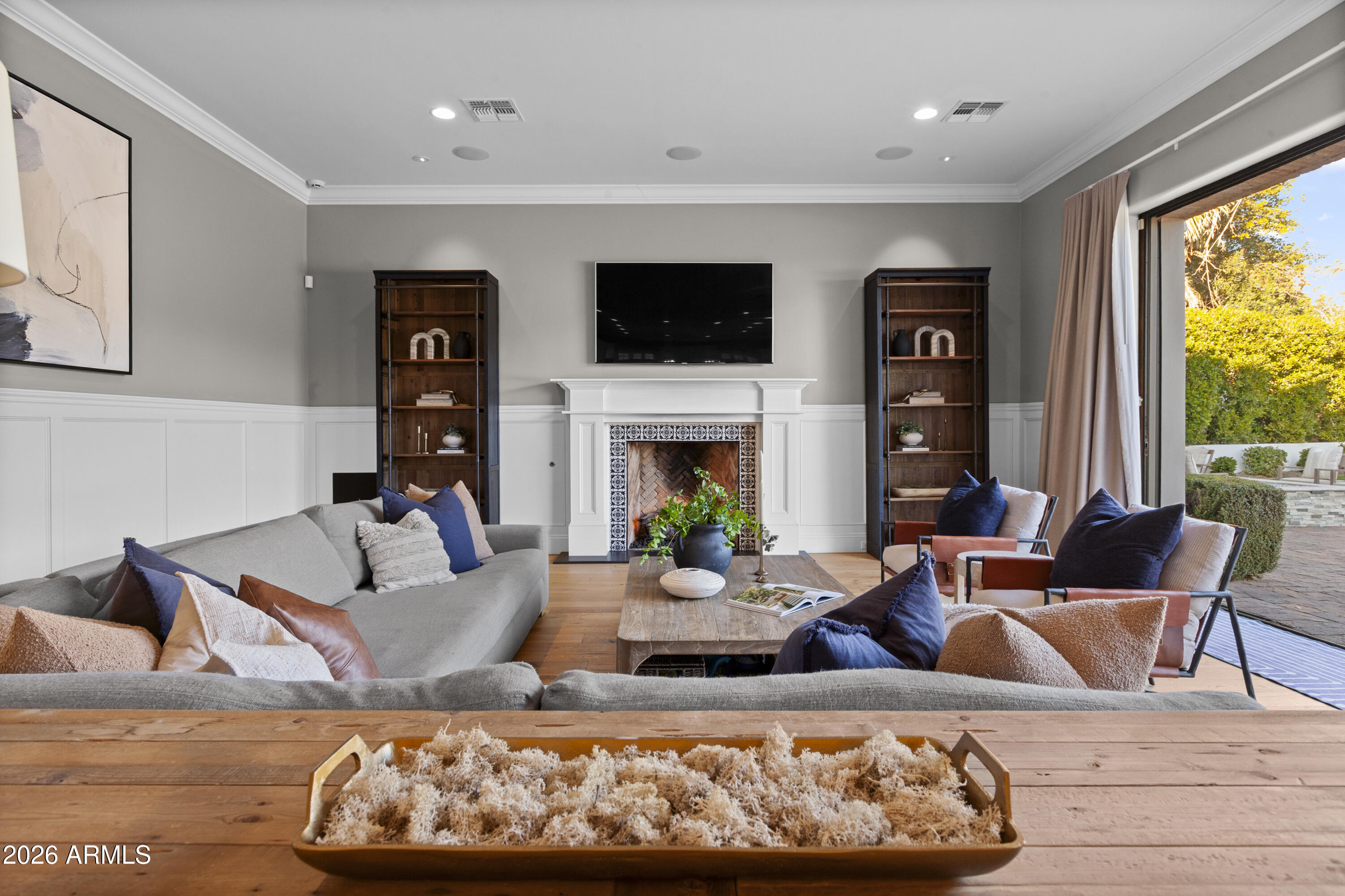 4909 North 45th Place Phoenix, AZ 85018 - Photo 15 of 45 a living room with furniture fireplace and flat screen tv