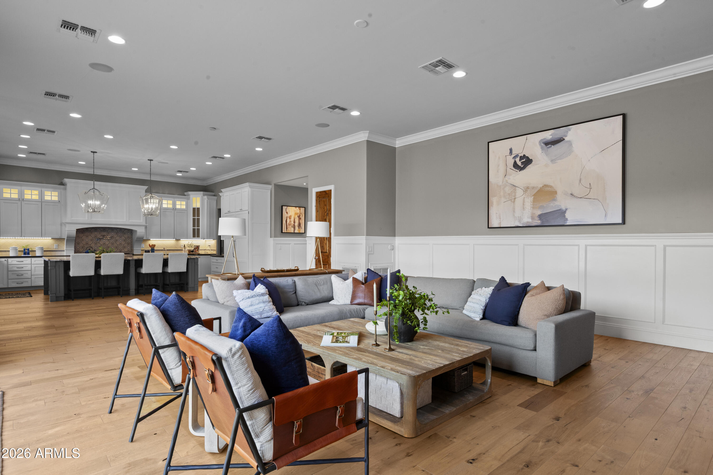 4909 North 45th Place Phoenix, AZ 85018 - Photo 16 of 45 a living room with furniture and kitchen view