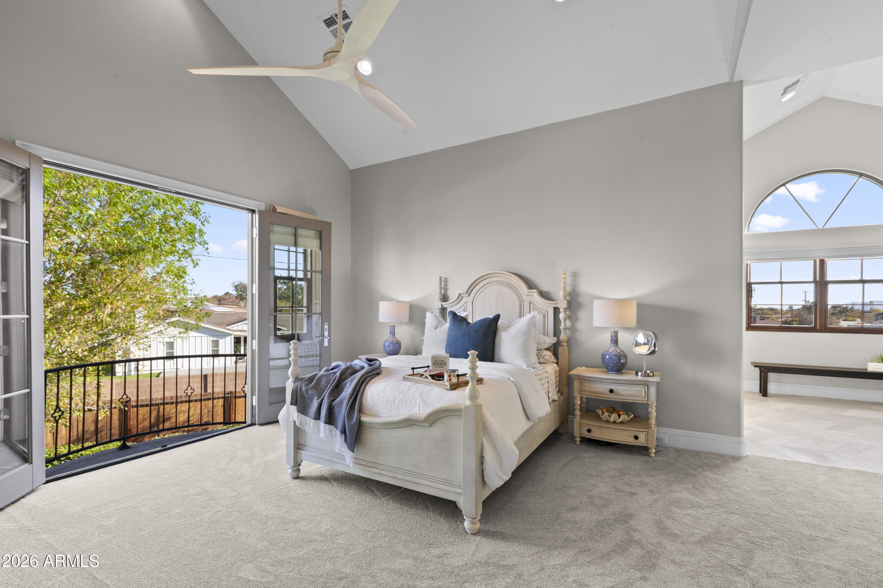 4909 North 45th Place Phoenix, AZ 85018 - Photo 31 of 45 a bed room with a bed and a night stand