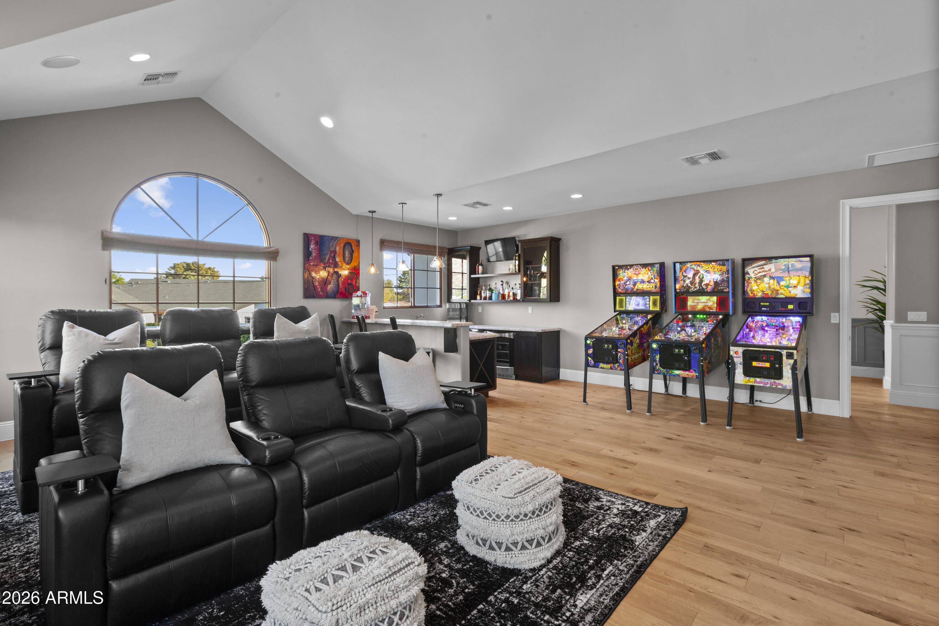 4909 North 45th Place Phoenix, AZ 85018 - Photo 37 of 45 a living room with furniture and a wooden floor