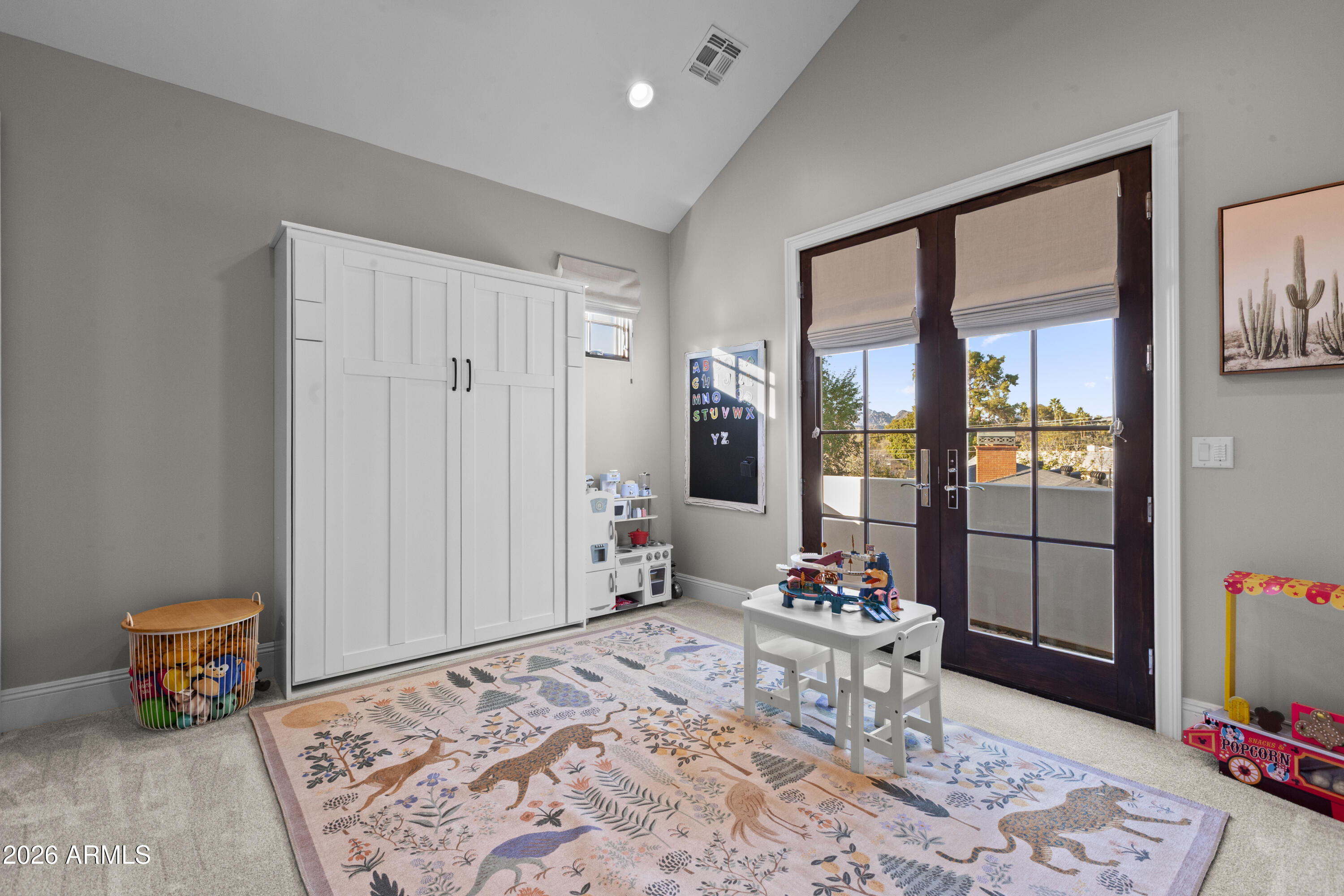 4909 North 45th Place Phoenix, AZ 85018 - Photo 40 of 45 a bedroom with a bed and a dresser