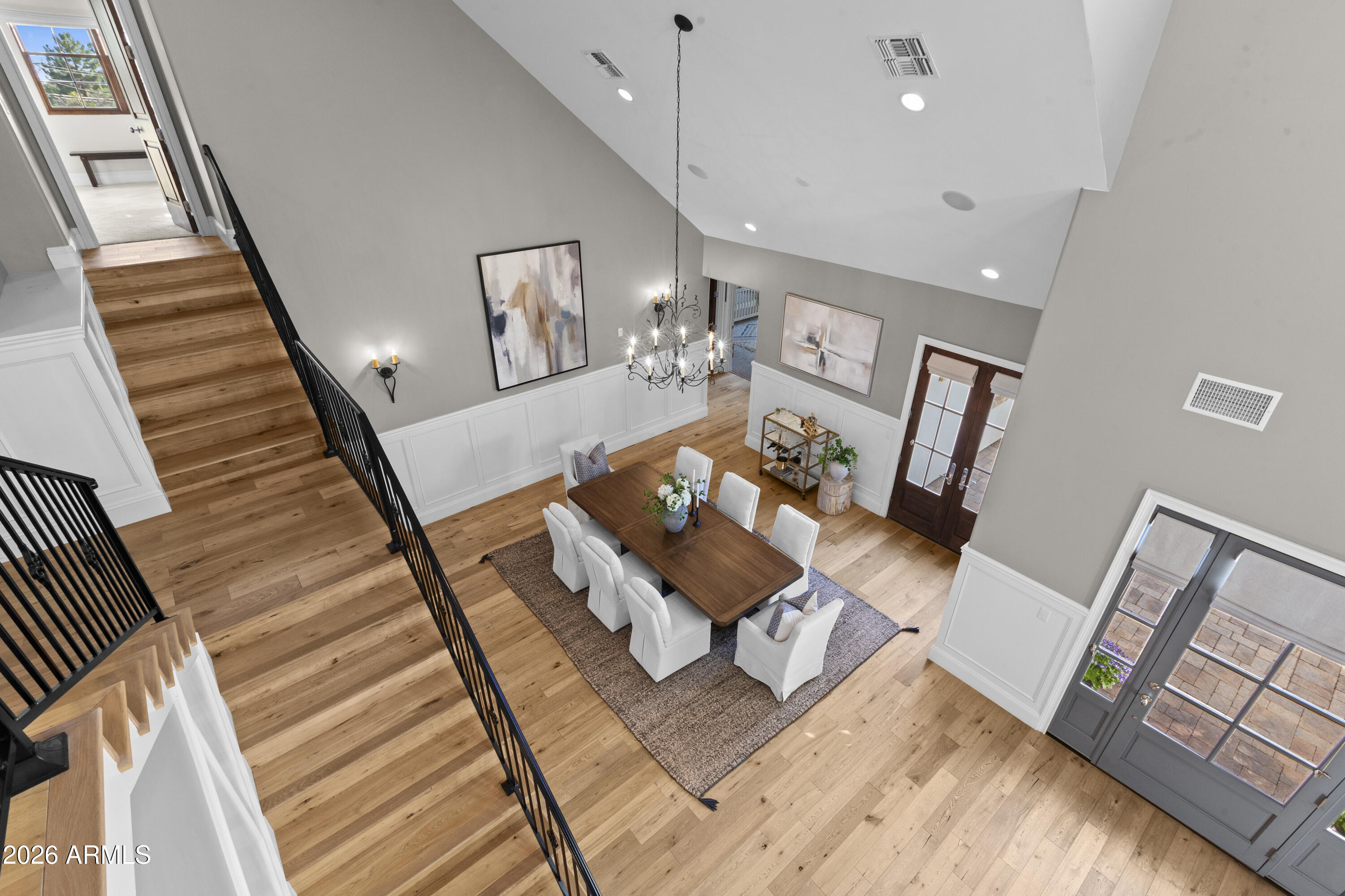 4909 North 45th Place Phoenix, AZ 85018 - Photo 44 of 45 a living room with furniture and a wooden floor