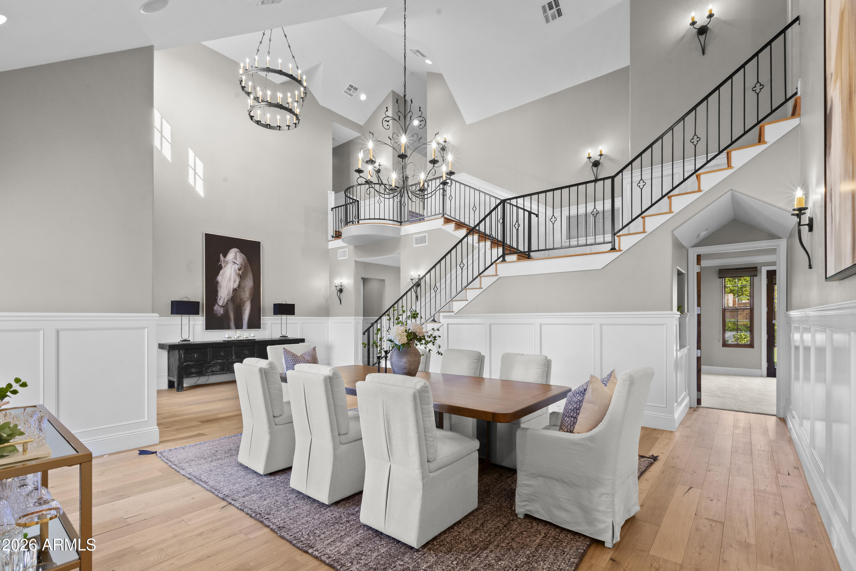 4909 North 45th Place Phoenix, AZ 85018 - Photo 9 of 45 a living room with lots of furniture and a chandelier