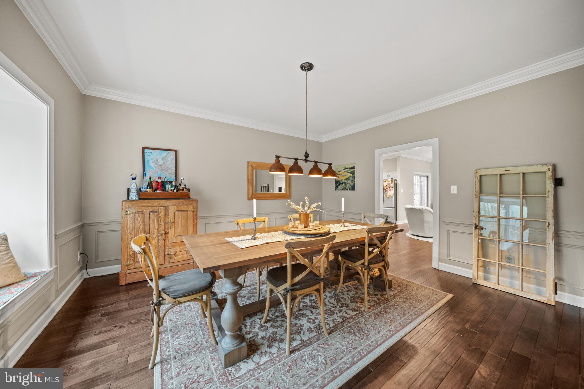 642 Springvale Road Great Falls, VA 22066 - Photo 12 of 50 a view of a dining room with furniture window and wooden floor