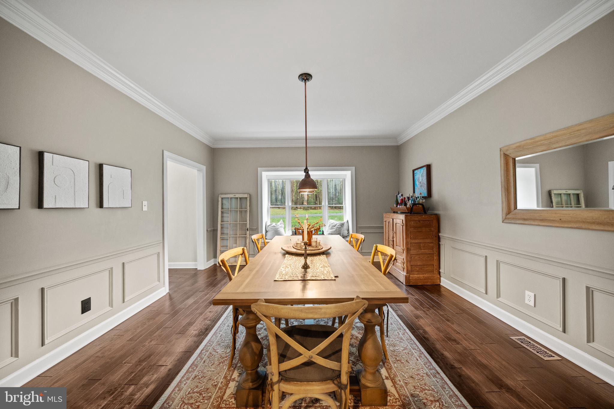 642 Springvale Road Great Falls, VA 22066 - Photo 13 of 50 a view of a dining room with furniture window and wooden floor