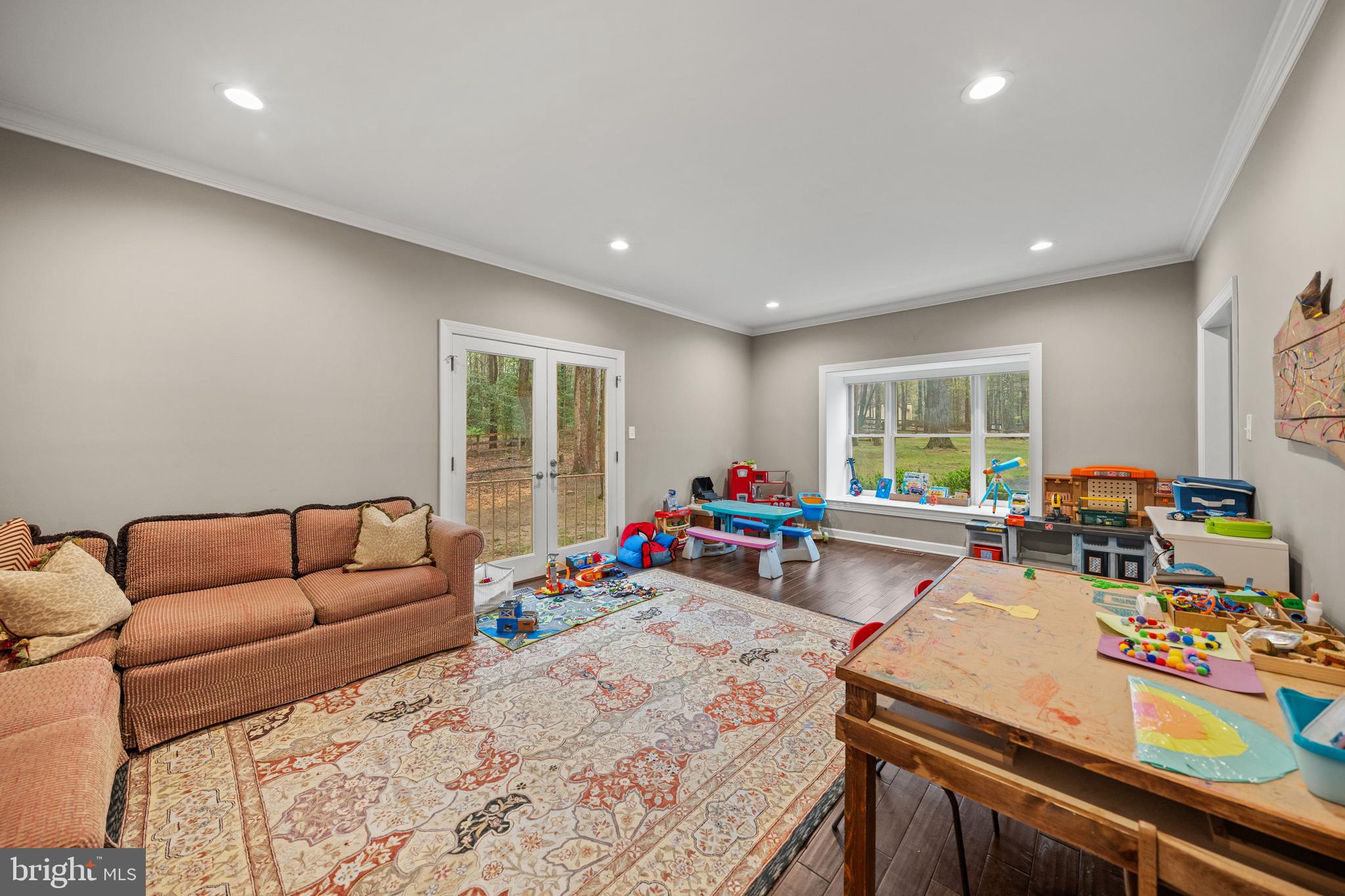 642 Springvale Road Great Falls, VA 22066 - Photo 15 of 50 a living room with furniture and a window