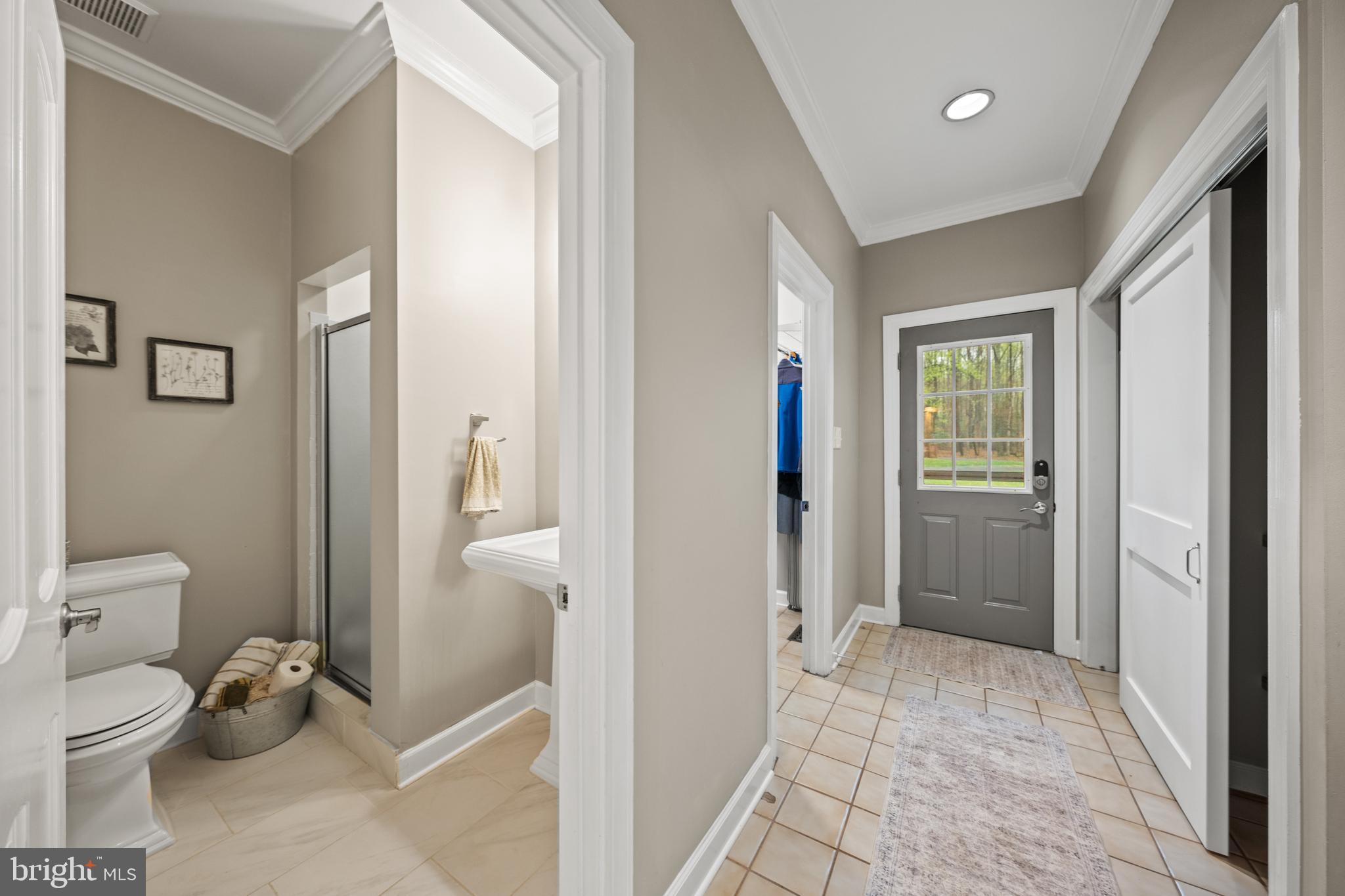 642 Springvale Road Great Falls, VA 22066 - Photo 18 of 50 a bathroom with a toilet sink and shower