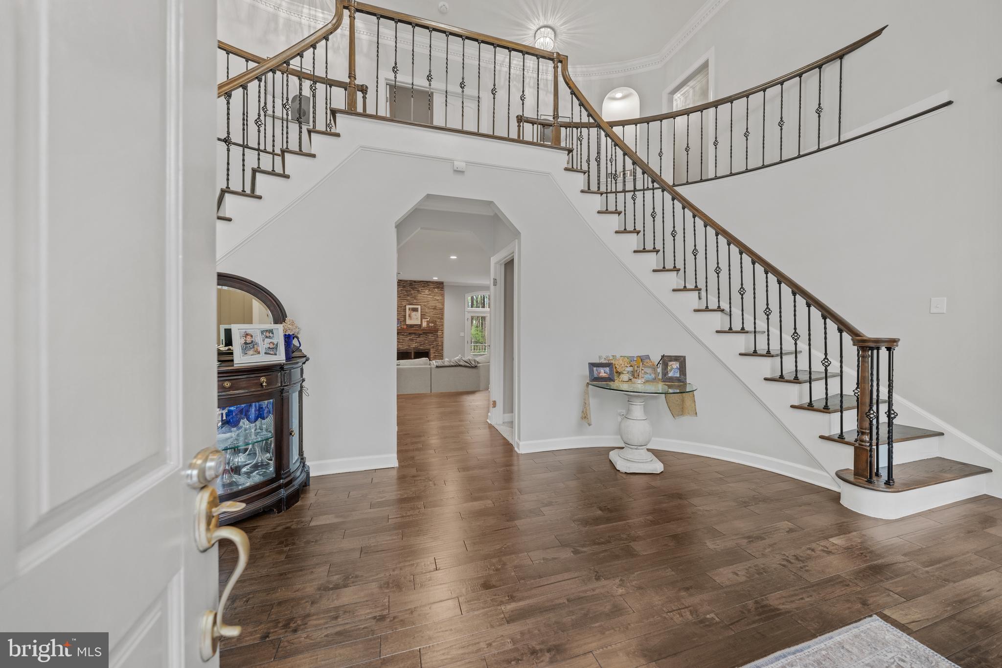 642 Springvale Road Great Falls, VA 22066 - Photo 2 of 50 a view of entryway and hall with wooden floor