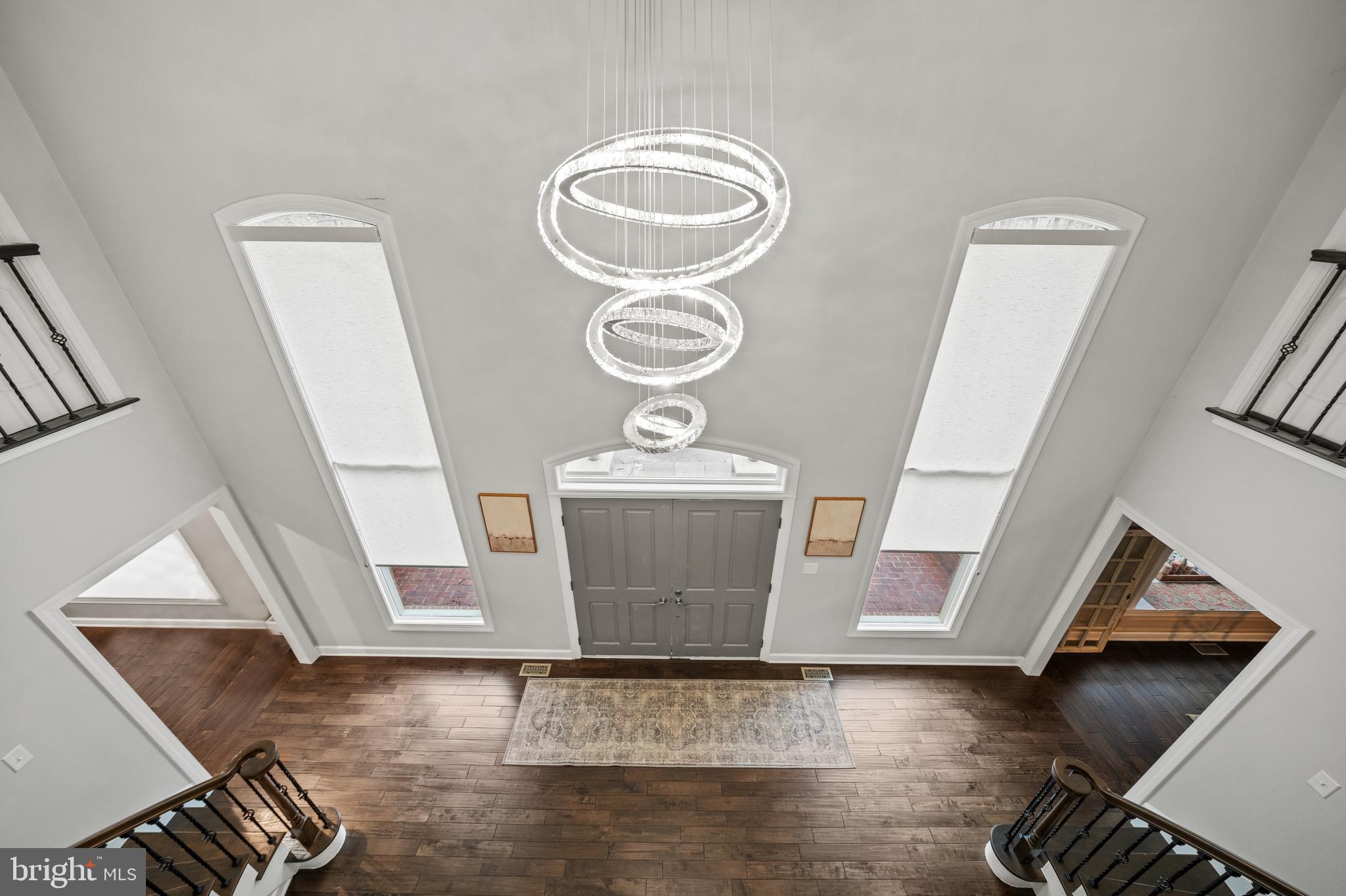 642 Springvale Road Great Falls, VA 22066 - Photo 22 of 50 a view of a room with wooden floor and staircase