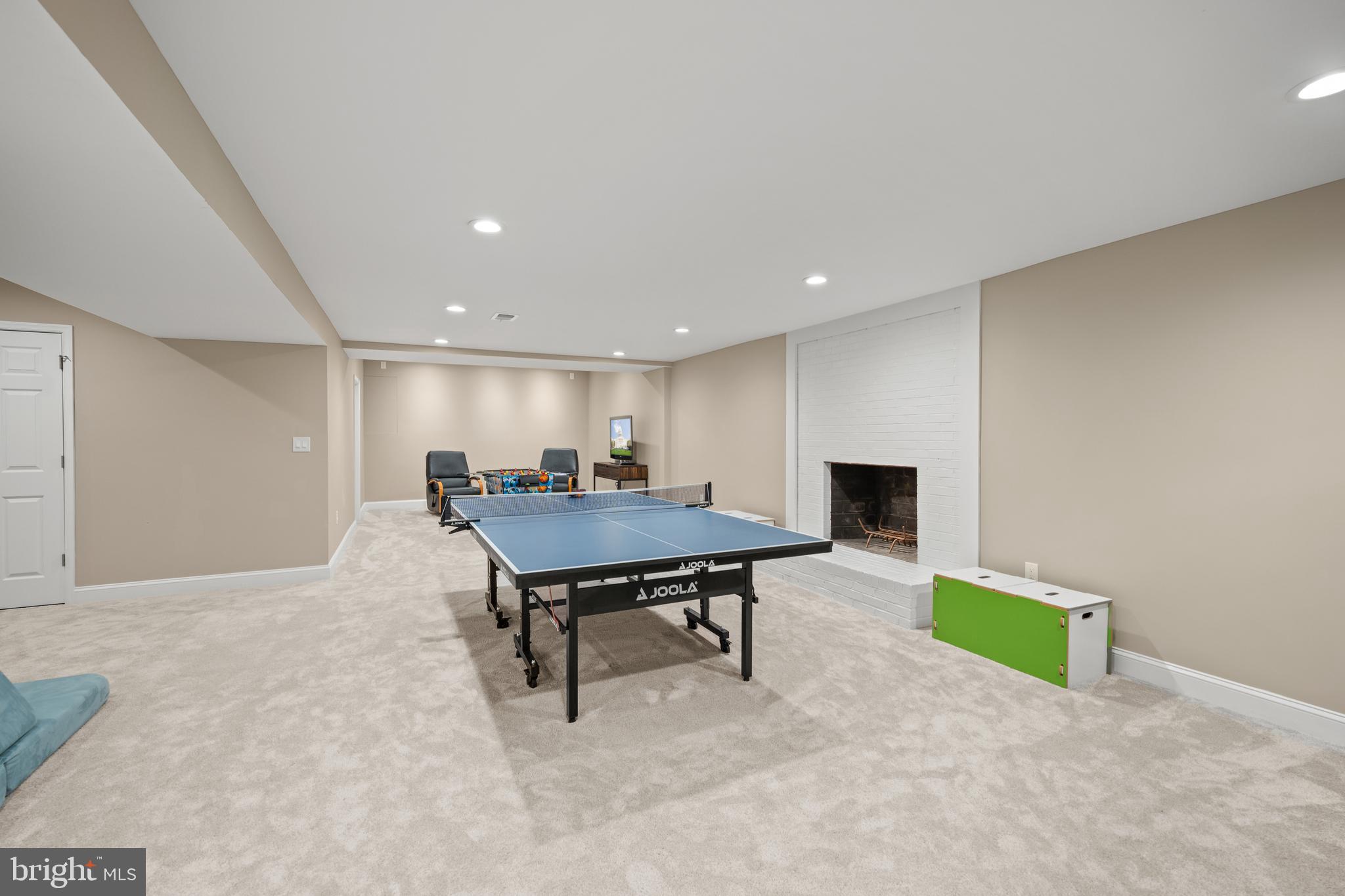 642 Springvale Road Great Falls, VA 22066 - Photo 36 of 50 a room with furniture pool table and chairs