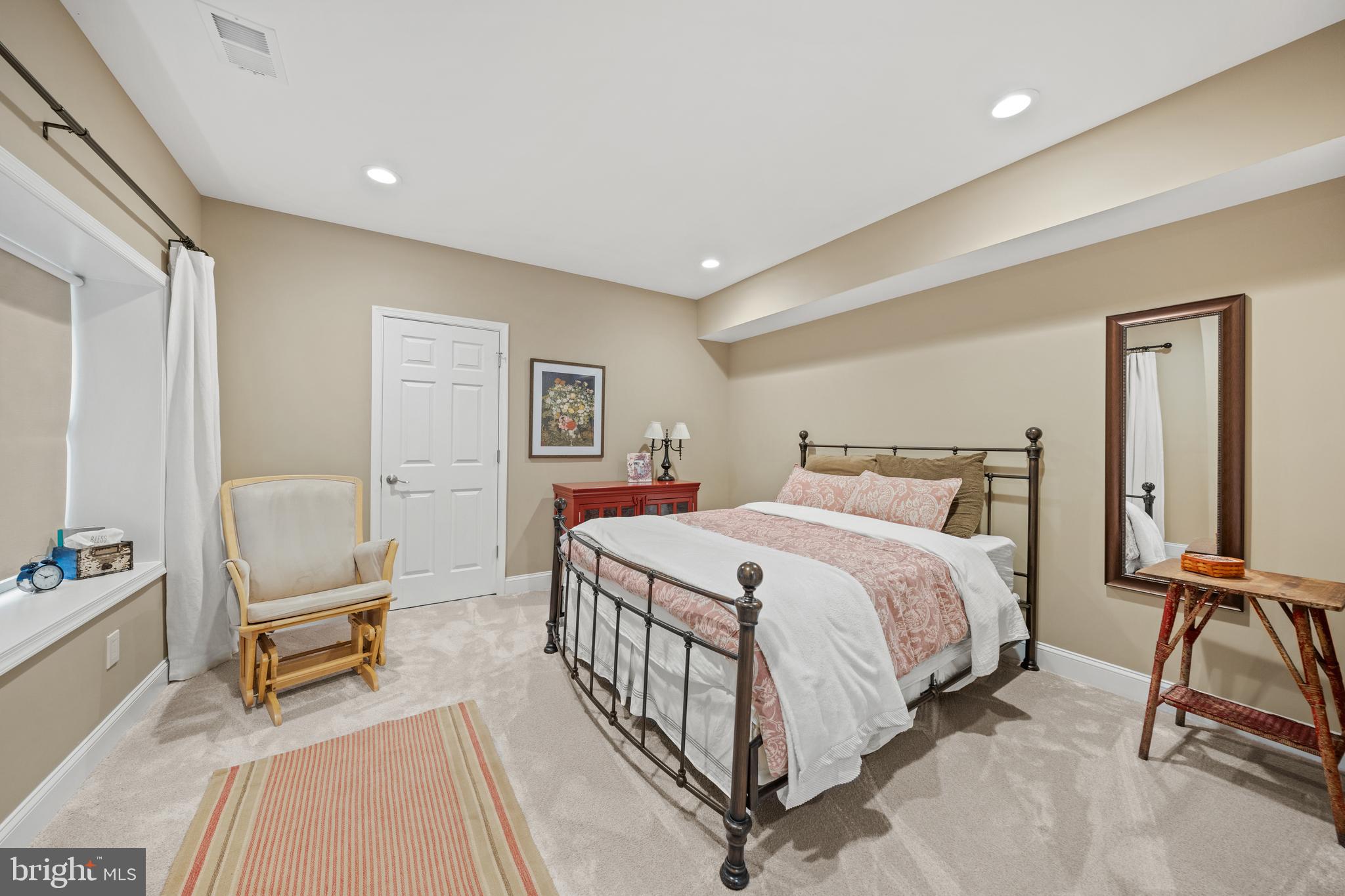 642 Springvale Road Great Falls, VA 22066 - Photo 39 of 50 a bedroom with a bed a chair and the view of bedroom