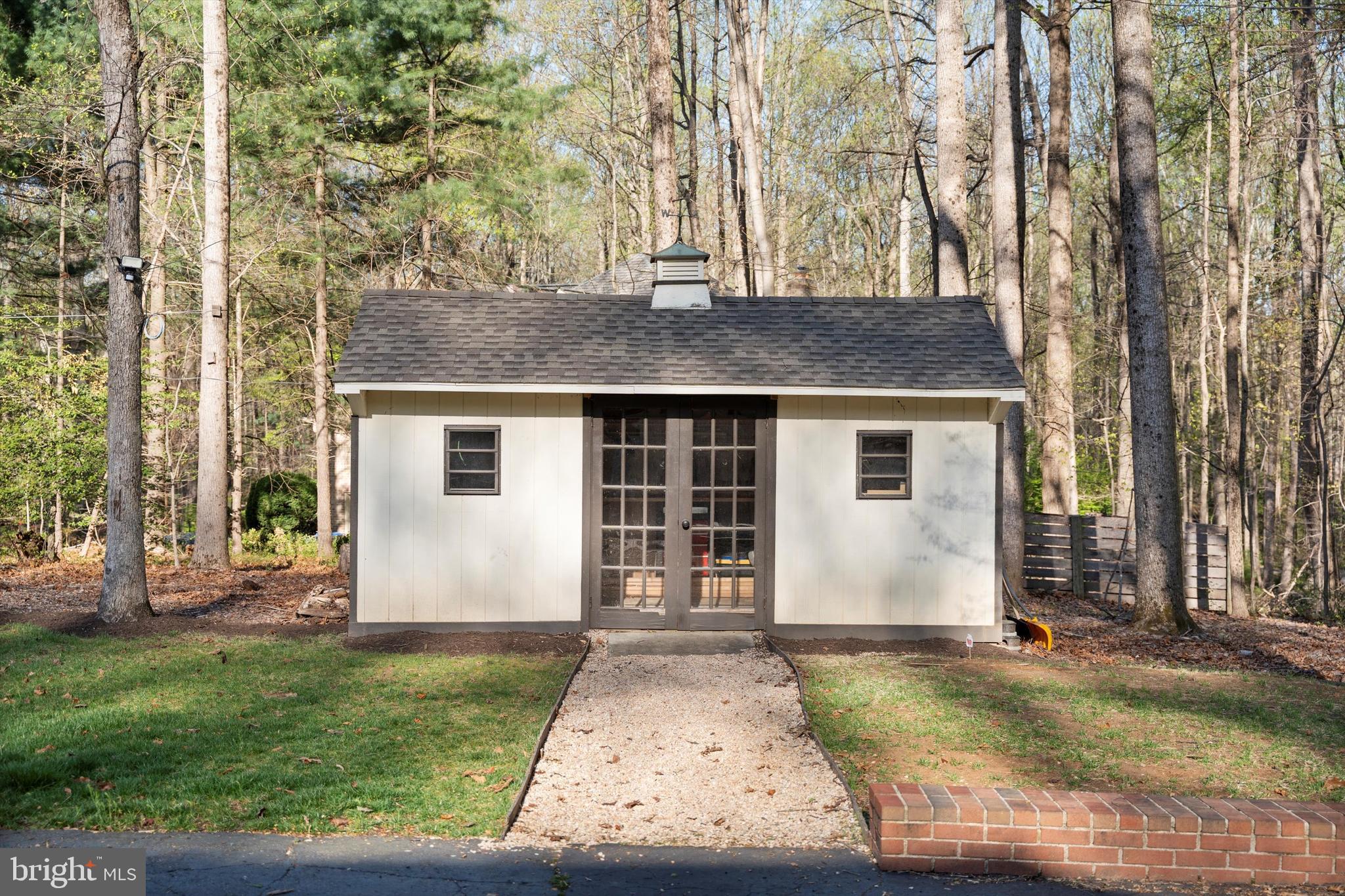 642 Springvale Road Great Falls, VA 22066 - Photo 46 of 50 front view of house with a yard