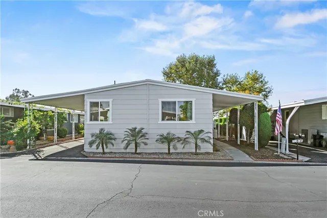 front view of a house with a patio
