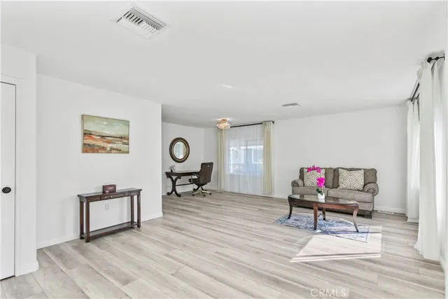 a view of storage and utility room with washer and dryer