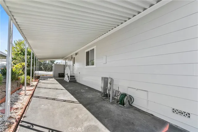 a view of a swimming pool with lounge chairs