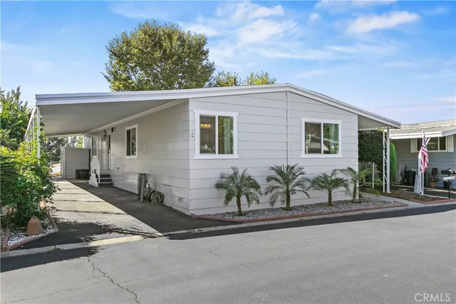 front view of a house with a small yard