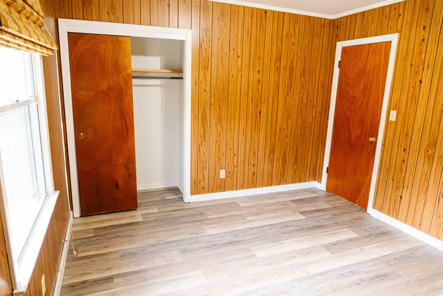 a bathroom with a shower curtain and a sink