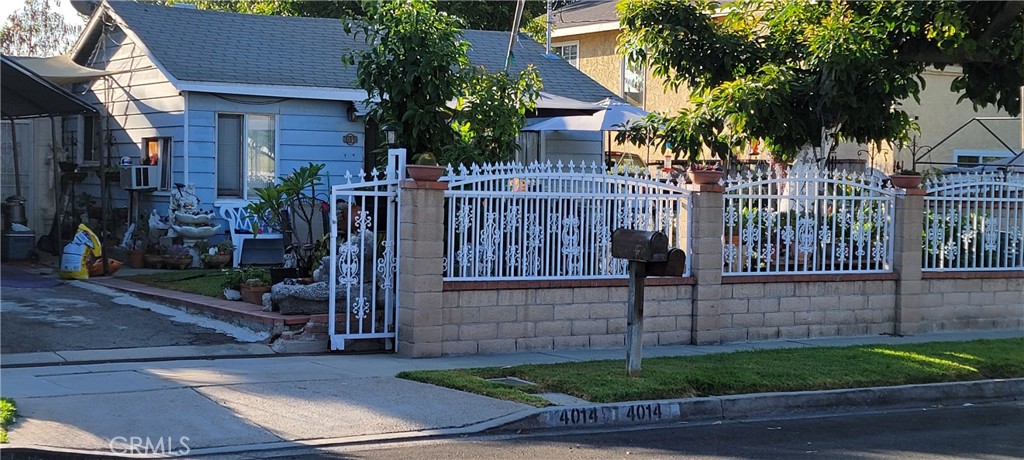 a view of a house with a street